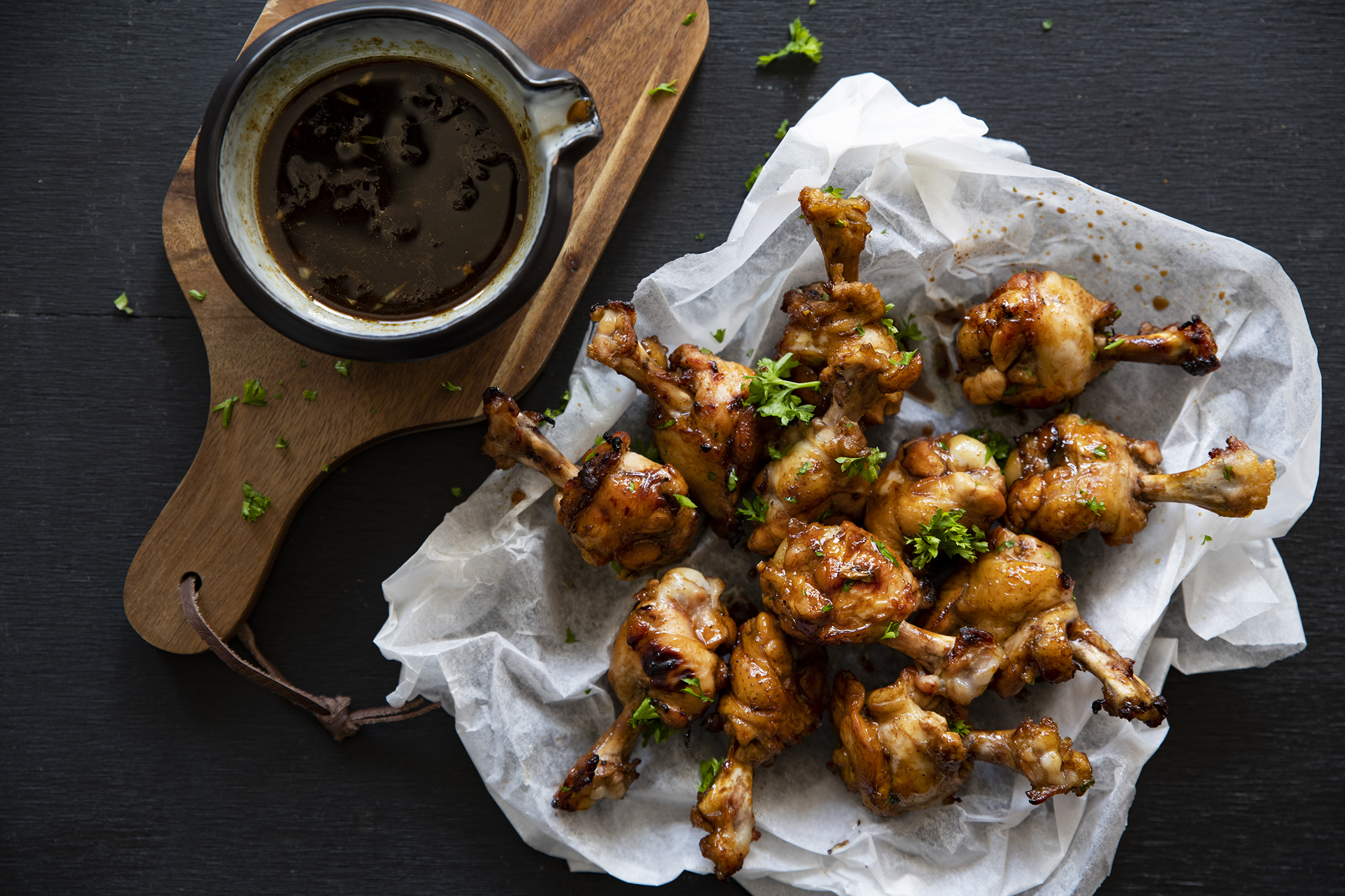 Pomegranate chicken lollipops